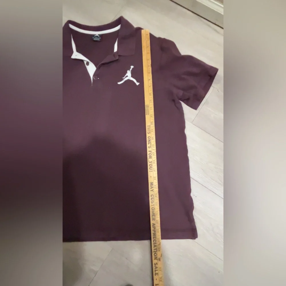 Nike Jordan Team men's golf polo shirt in a burgundy color
